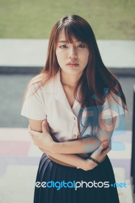 Portrait Of Thai Adult Student University Uniform Beautiful Girl Relax And Smile Stock Photo