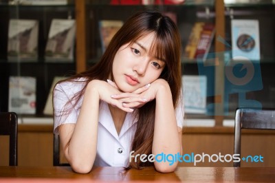 Portrait Of Thai Adult Student University Uniform Beautiful Girl Relax And Smile Stock Photo