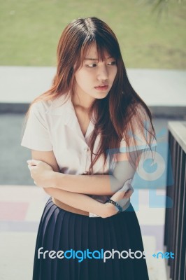 Portrait Of Thai Adult Student University Uniform Beautiful Girl Relax And Smile Stock Photo