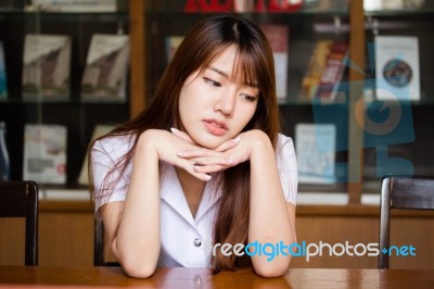 Portrait Of Thai Adult Student University Uniform Beautiful Girl Relax And Smile Stock Photo