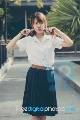 Portrait Of Thai Adult Student University Uniform Beautiful Girl Relax And Smile Stock Photo