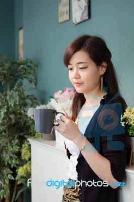 Portrait Of Thai Adult Women Office Beautiful Girl Drinking Coffee Stock Photo