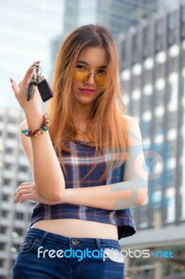 Portrait Of Thai Chinese Adult Beautiful Girl Denim Blue Bag And Key Stock Photo