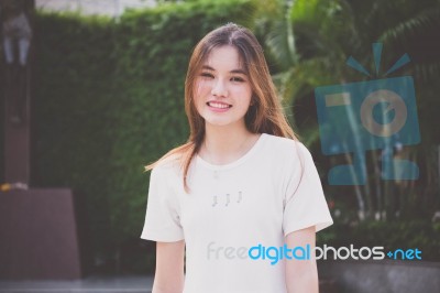 Portrait Of Thai Chinese Adult Beautiful Girl Denim Blue Bag Relax And Smile Stock Photo