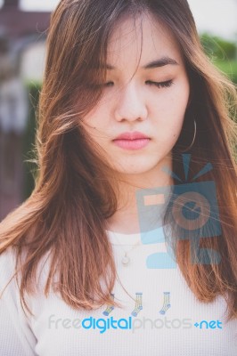 Portrait Of Thai Chinese Adult Beautiful Girl Denim Blue Bag Relax And Smile Stock Photo