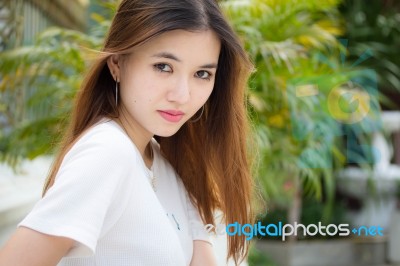 Portrait Of Thai Chinese Adult Beautiful Girl Denim Blue Bag Relax And Smile Stock Photo