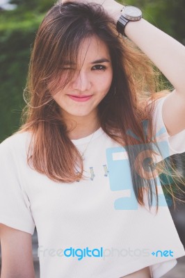 Portrait Of Thai Chinese Adult Beautiful Girl Denim Blue Bag Relax And Smile Stock Photo