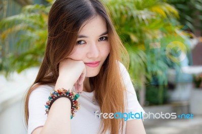 Portrait Of Thai Chinese Adult Beautiful Girl Denim Blue Bag Relax And Smile Stock Photo