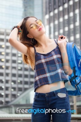 Portrait Of Thai Chinese Adult Beautiful Girl Denim Blue Bag Travel Relax And Smile Stock Photo