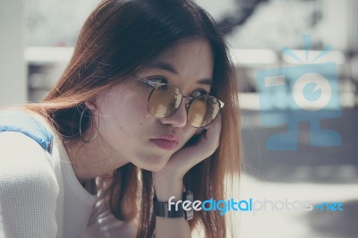 Portrait Of Thai Chinese Adult Glasses Beautiful Girl Denim Blue Bag Relax And Smile Stock Photo