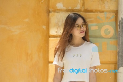 Portrait Of Thai Chinese Adult Glasses Beautiful Girl Denim Blue Bag Relax And Smile Stock Photo