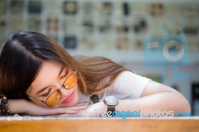 Portrait Of Thai Chinese Adult Glasses Beautiful Girl Denim Blue Bag Relax And Smile Stock Photo