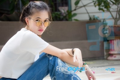 Portrait Of Thai Chinese Adult Glasses Beautiful Girl Denim Blue Bag Relax And Smile Stock Photo