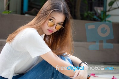 Portrait Of Thai Chinese Adult Glasses Beautiful Girl Denim Blue Bag Relax And Smile Stock Photo