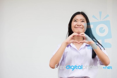 Portrait Of Thai High School Student Uniform Beautiful Girl Give Heart Stock Photo