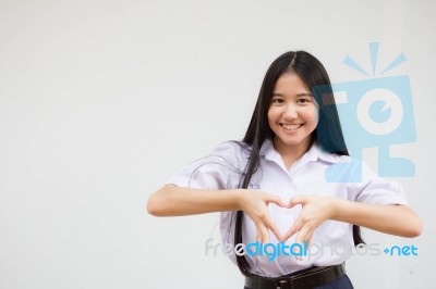 Portrait Of Thai High School Student Uniform Beautiful Girl Give Heart Stock Photo