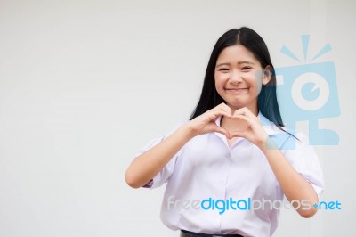 Portrait Of Thai High School Student Uniform Beautiful Girl Give Heart Stock Photo