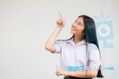 Portrait Of Thai High School Student Uniform Beautiful Girl Pointing Stock Photo