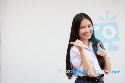 Portrait Of Thai High School Student Uniform Beautiful Girl Pointing Stock Photo