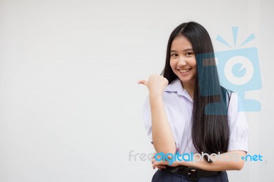 Portrait Of Thai High School Student Uniform Beautiful Girl Pointing Stock Photo