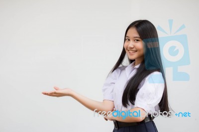 Portrait Of Thai High School Student Uniform Beautiful Girl Show Hand Stock Photo