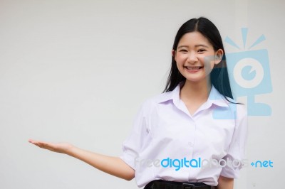 Portrait Of Thai High School Student Uniform Beautiful Girl Show Hand Stock Photo