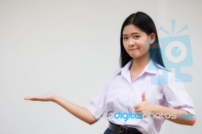 Portrait Of Thai High School Student Uniform Beautiful Girl Show Hand Stock Photo