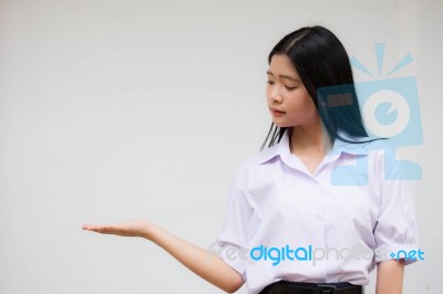 Portrait Of Thai High School Student Uniform Beautiful Girl Show Hand Stock Photo