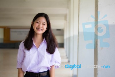 Portrait Of Thai High School Student Uniform Teen Beautiful Girl Happy And Relax Stock Photo