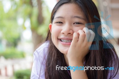 Portrait Of Thai High School Student Uniform Teen Beautiful Girl Happy And Relax Stock Photo