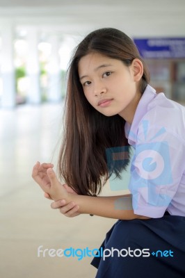 Portrait Of Thai High School Student Uniform Teen Beautiful Girl Happy And Relax Stock Photo