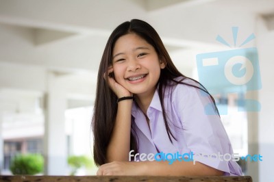 Portrait Of Thai High School Student Uniform Teen Beautiful Girl Happy And Relax Stock Photo