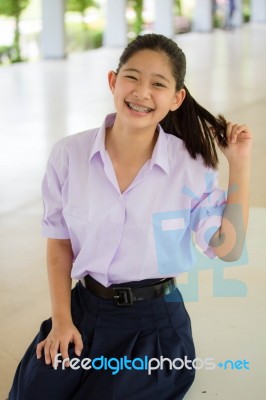 Portrait Of Thai High School Student Uniform Teen Beautiful Girl Happy And Relax Stock Photo