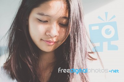 Portrait Of Thai Student Teen Beautiful Girl Relax And Smile Stock Photo