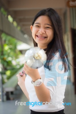 Portrait Of Thai Student Teen Beautiful Girl Relax And Smile Stock Photo