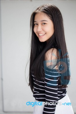 Portrait Of Thai Student Teen Beautiful Girl Relax And Smile Stock Photo