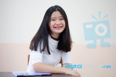 Portrait Of Thai Student Teen Beautiful Girl Relax And Smile Stock Photo