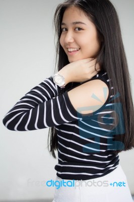 Portrait Of Thai Student Teen Beautiful Girl Relax And Smile Stock Photo