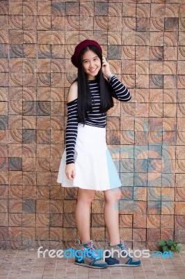 Portrait Of Thai Student Teen Beautiful Girl Relax And Smile Stock Photo