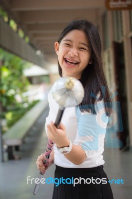 Portrait Of Thai Student Teen Beautiful Girl Relax And Smile Stock Photo