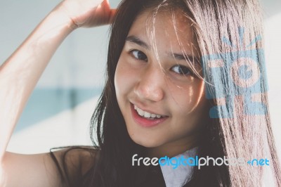 Portrait Of Thai Student Teen Beautiful Girl Relax And Smile Stock Photo