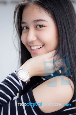 Portrait Of Thai Student Teen Beautiful Girl Relax And Smile Stock Photo