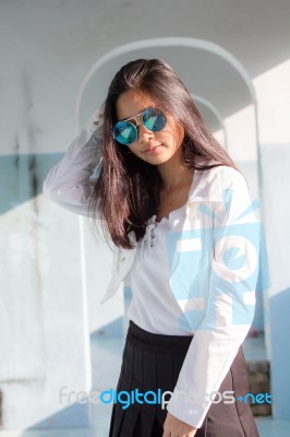 Portrait Of Thai Student Teen Beautiful Girl Relax And Smile Stock Photo