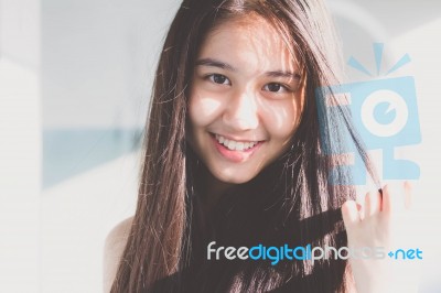 Portrait Of Thai Student Teen Beautiful Girl Relax And Smile Stock Photo