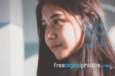 Portrait Of Thai Student Teen Beautiful Girl Relax And Smile Stock Photo