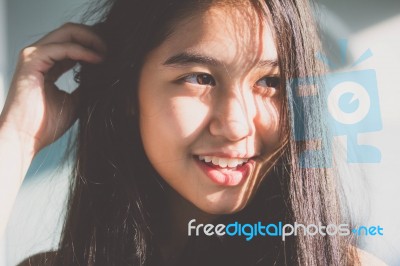 Portrait Of Thai Student Teen Beautiful Girl Relax And Smile Stock Photo