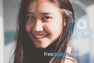 Portrait Of Thai Student Teen Beautiful Girl Relax And Smile Stock Photo