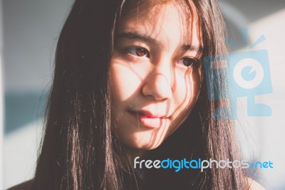 Portrait Of Thai Student Teen Beautiful Girl Relax And Smile Stock Photo