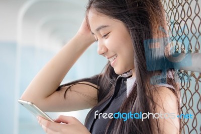 Portrait Of Thai Teen Beautiful Girl Calling Smart Phone Stock Photo