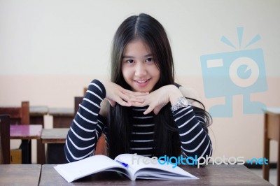 Portrait Of Thai Teen Beautiful Girl Reading Book Stock Photo